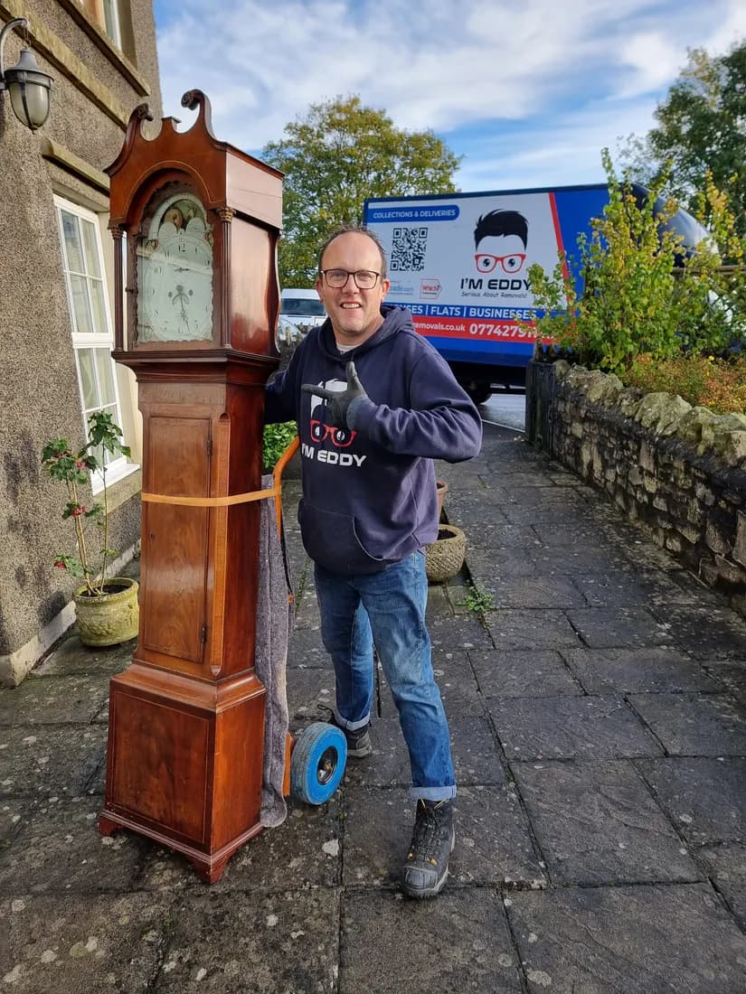 Carefully moving an antique grandfather clock — single-item removals