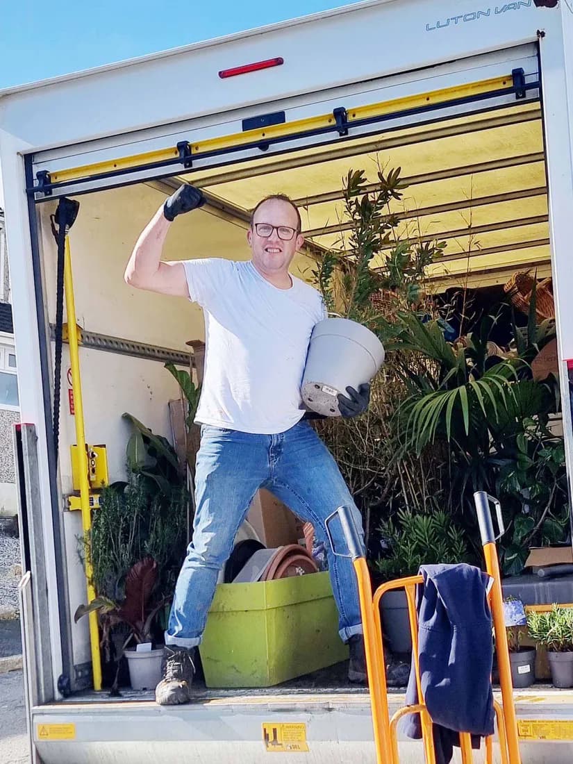In the back of the loaded van mid-removal